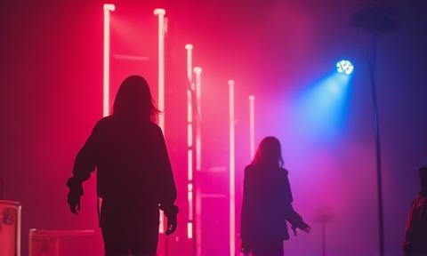 Dynamic video still from a music project with vibrant lighting.